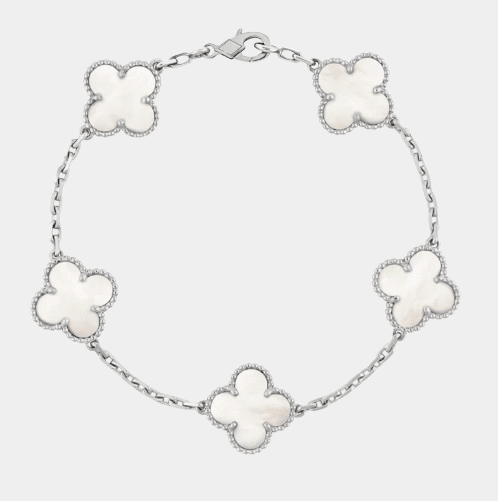 Minimalist silver bracelet with five white Mother of Pearl clover charms for a sophisticated, "quiet luxury" look.