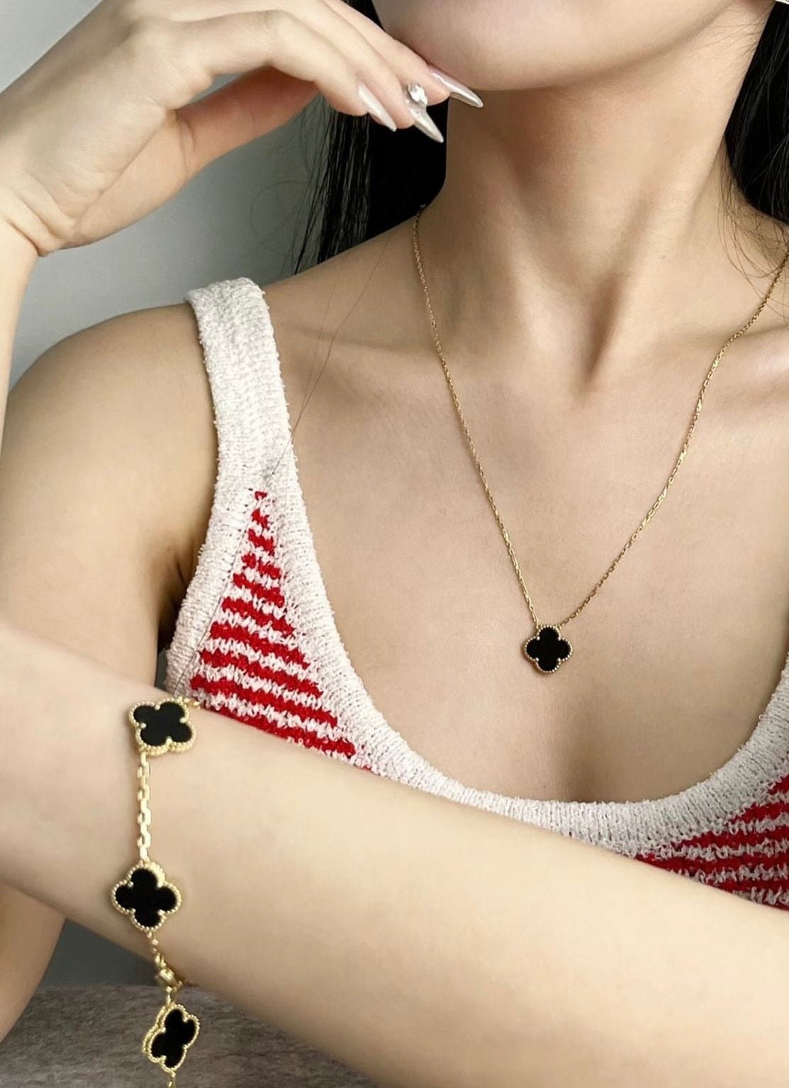 Stunning 18k gold and Onyx clover necklace, a perfect luxury gift for her inspired by timeless designs.
